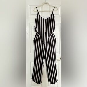 jumpsuit small white and black stripes sleeveless design w thin straps on top.